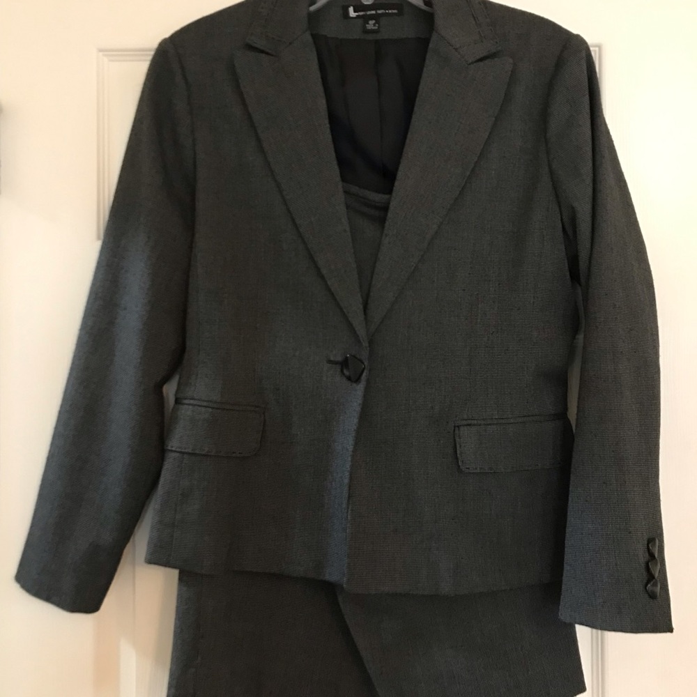Gray Suit Jacket with matching Skirt.